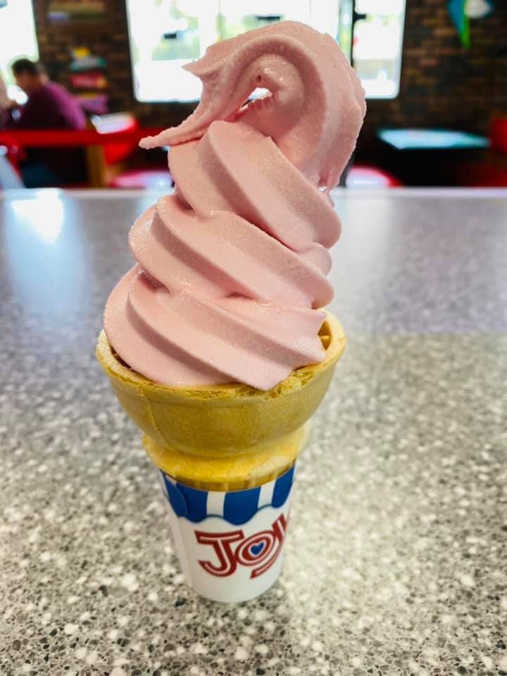 The Launching Pad's new Watermelon Dole Whip, served in a classic Joy cone.