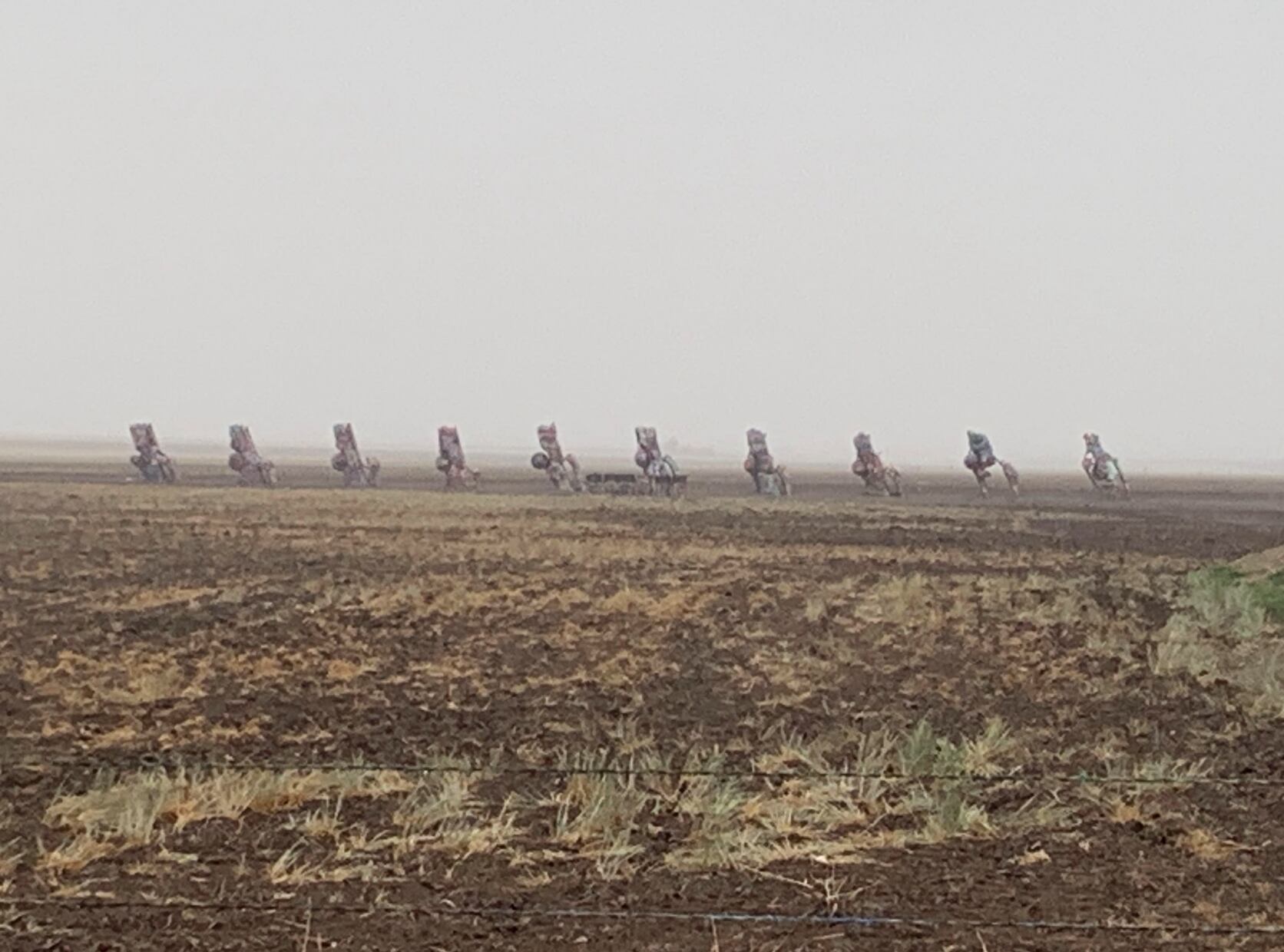 Standing along Route 66 west of Amarillo, Texas, Cadillac Ranch was invented and built by a group of avant garde artists from San Francisco - standing as one of the most unique roadside attractions along Rt. 66.