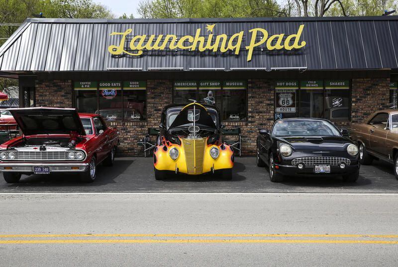 Several classic cars sit parked in front of the Launching Pad restaurant on Friday in Wilmington.